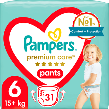 zielone male kulki w kupce niemowlaka pampers